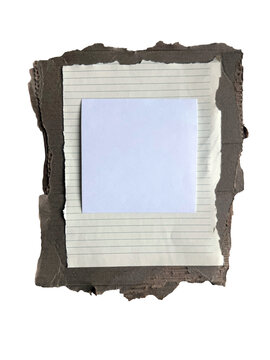 Blank Paper Note on Torn Cardboard Background