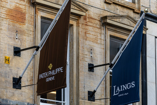 Flags of Patek Philippe and Laings in Glasgow, Scotland, UK.
