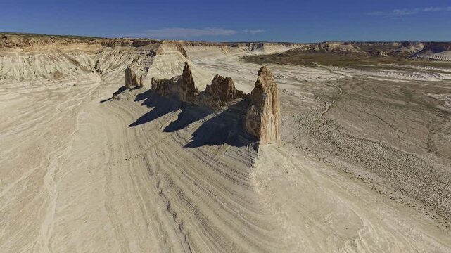 Aerial Forward Movement Over White Limestone Rock Formation