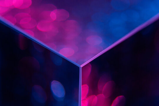 Neon glass cube corner with abstract bokeh reflection