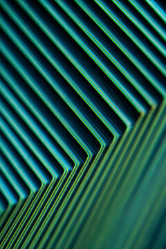 Abstract teal and blue diagonal neon line pattern