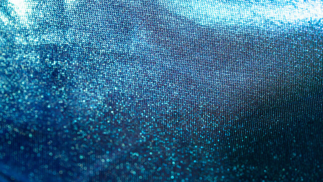Abstract blue digital particle texture with glowing data pattern
