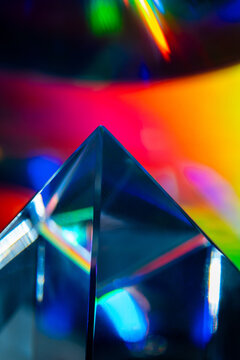 Futuristic prism with colorful light refraction background