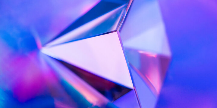 Futuristic prismatic glass background with neon reflections