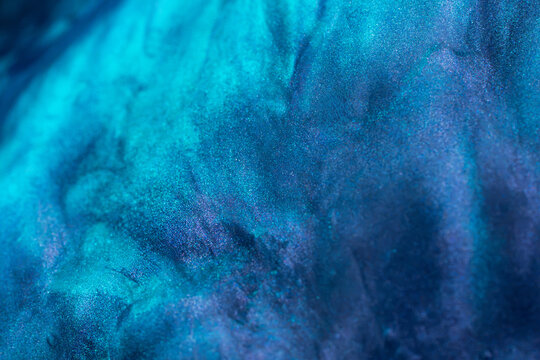 Abstract blue and purple powder cloud background texture