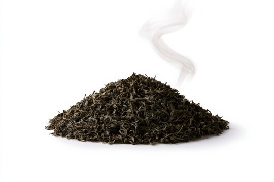 Pile of dried tea leaves with rising steam on white background