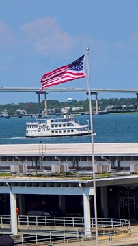 Footage of a boat sailing along the waterfront in Charleston South Carolina USA