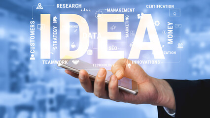 Obraz premium Business Concept with Focus on Idea Generation and Innovation Displayed on a Digital Device in a Modern Office Environment Haptic.