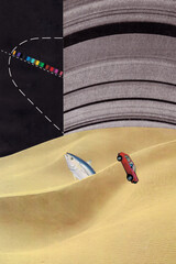 A tuna fish emerges in the middle of the desert, and a car is stranded, stuck in the sand. There are images of Saturn’s rings and orbits—everything appears bizarre and surreal. © Lerson Pannawit