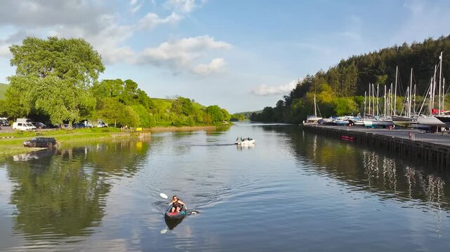 Women in a kayak on the River Dart in Totnes from a drone, Devon, England