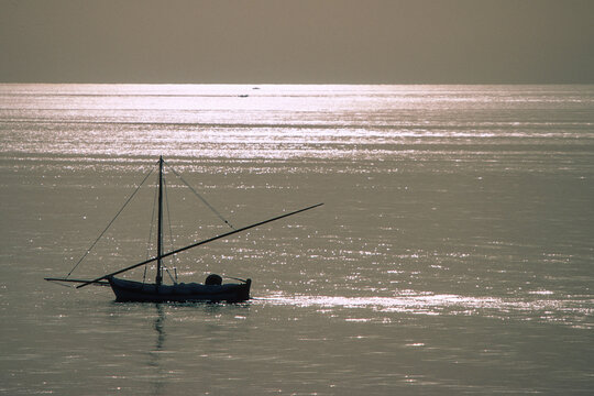 Barca di Pescatori al tramonto. Fishermen boat at sunset