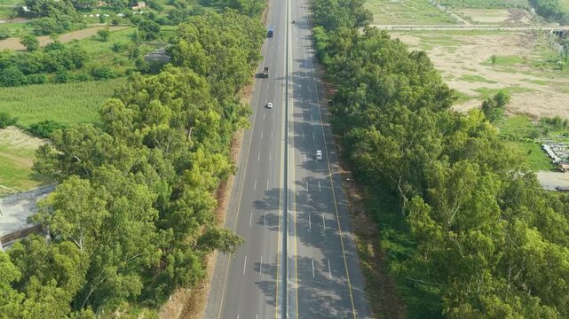 Aerial Drone Footage of Pakistan Motorway Through Green Landscape