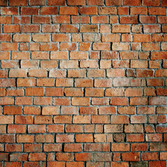 Fototapeta premium Rustic Orange Brick Wall Texture with Weathered Surface Detail