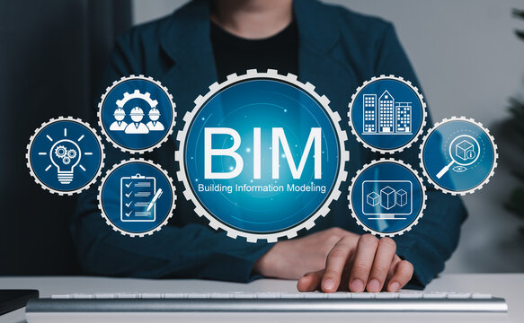 Engineer typing on keyborad with BIM Icons representing Building Information Modeling technology for architecture, data, construction planning, 3D modeling, software and digital project collaboration.