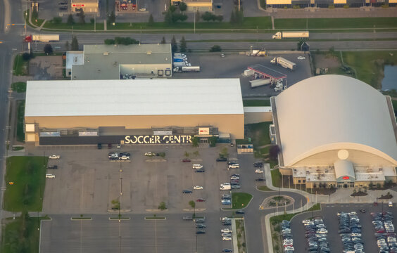 Calgary, Alberta, Canada. Sep 9, 2026. Aerial view of Calgary Soccer Centre complex buildings and parking lot in northeast industrial district.