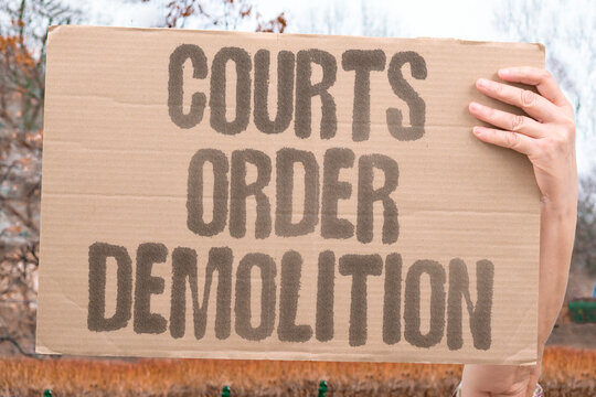 "Courts order demolition" Judicial rulings mandate destruction of Palestinian structures on claimed land. ENFORCEMENT. LAW. BULLDOZER. DESTRUCTION. IRREVERSIBLE.