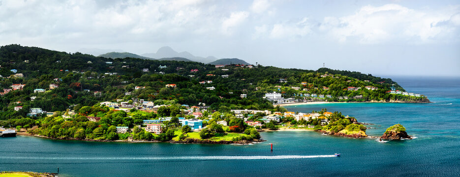 Scenic coastline with tropical green hills and turquoise ocean waters near Castries in Saint Lucia.