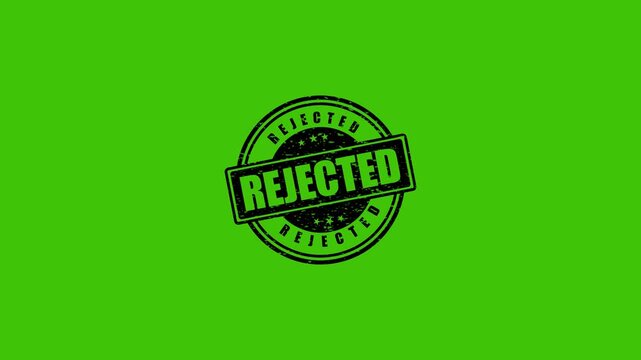 Rejected rubber stamp impression with grunge texture isolated on a solid green screen background