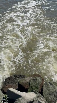 Estuary waves hitting riprap rocks, DeKorte Park Lyndhurst