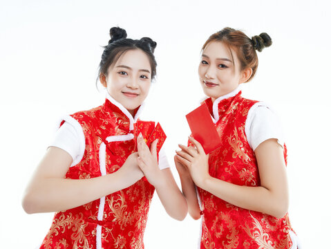 A cute Chinese girl in festive attire against a white background