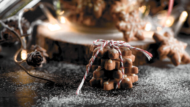 Stacked star-shaped Christmas cookies tied with twine