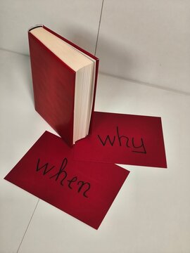 Red book and cards "when, why"