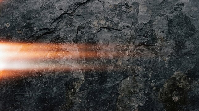 Dynamic fire and smoke explosion against rugged dark rock surface for dramatic visual impact