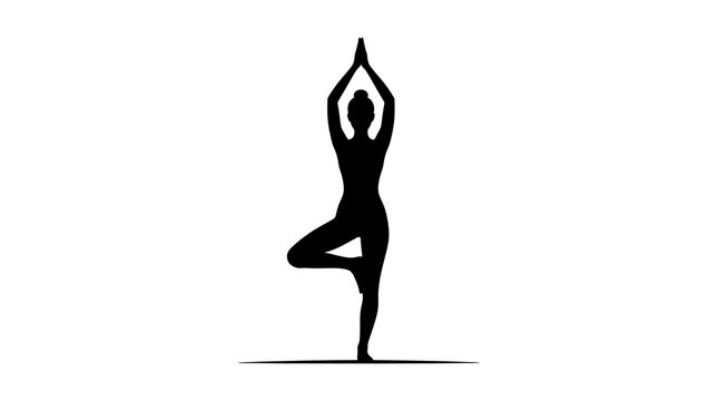 Woman practicing yoga in tree pose
