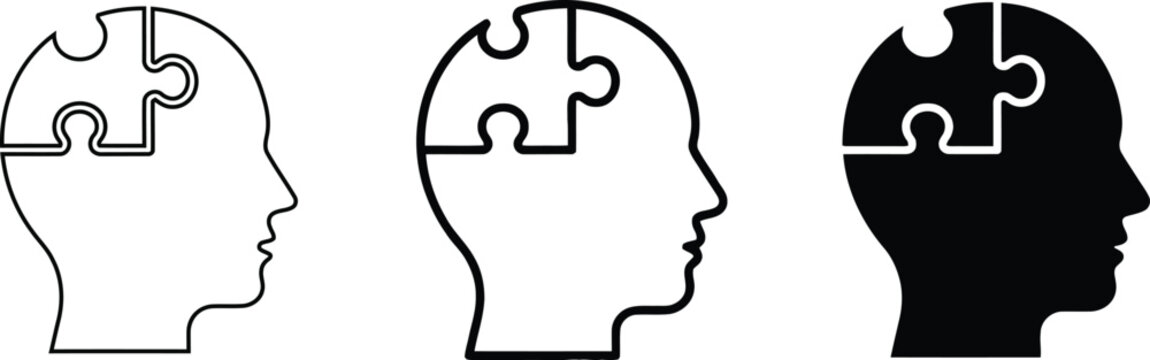 Human head profile icons with puzzle piece element