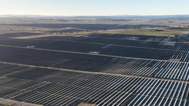 Aerial View of Vast Solar Farm Generating Clean Renewable Energy