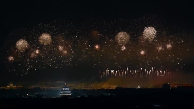 Fireworks exploding over Beijing Temple of Heaven at night during national celebration