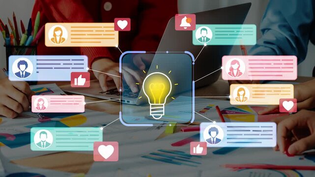 Concept of creative collaboration in a modern workspace with light bulb symbolizing ideas and communication through digital interactions among professionals. Entropy.
