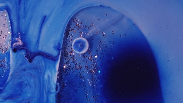 Paint fluid. Oil ink bubbles. Defocused blue white color water sequins vibrant splash round marble texture floating on abstract acrylic art background.