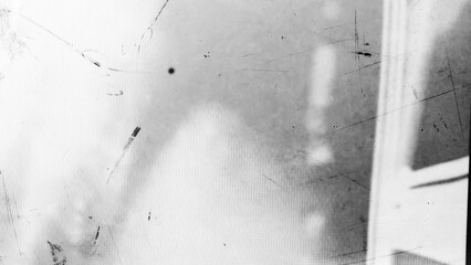 Plakat Abstract dirty or aging film. Dust particle and grain texture or dirt use for overlay film frame effect. Dust scratches effect for vintage film grunge textured effect design.