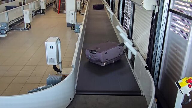 An airport luggage belt. Baggage carousel or luggage carousel.