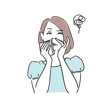 鼻が詰まっている女性　風邪花粉症の症状