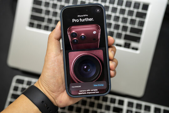 Smartphone displaying new Apple iPhone 18 Pro product launch. modern technology product release, flagship smartphone trend.