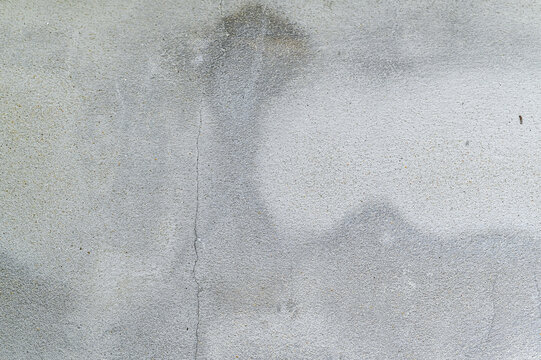 Wall texture background with abstract stains, scratches, and aged surfaces providing a unique vintage backdrop.