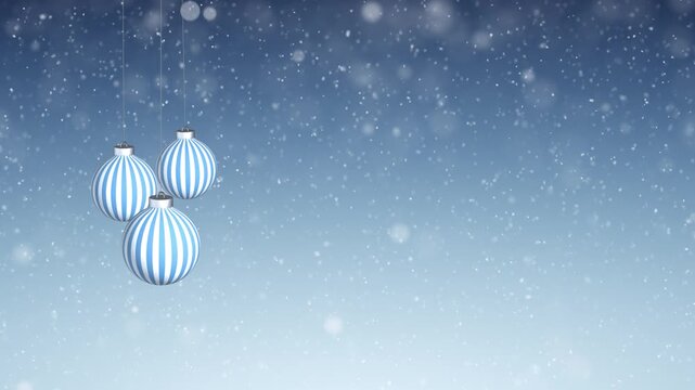 Loop swinging baubles on winter snowfall blue day sky light copy space animation background.
