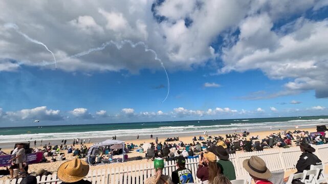Crowd Watching Airshow Smoke Trails Over Surfers Paradise Beach