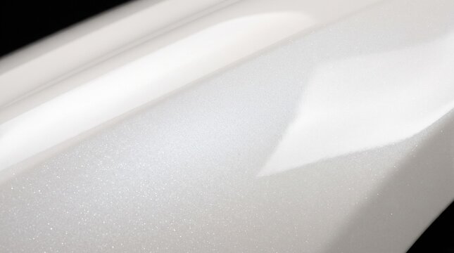 Shiny white car paint texture with metallic flakes and smooth glossy surface finish closeup
