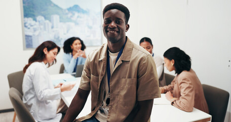 Obraz premium Portrait, smile and man in meeting with doctors for administration, about us and medical coder. Happy person, hospital and health information technician with healthcare team, confidence and pride