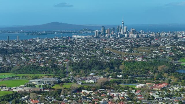 Scenic aerial view capturing the Auckland city skyline and suburbs from Pt Chev in Auckland, New Zealand, to showcase the urban landscape.