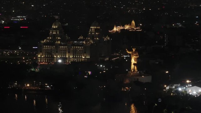 Night View of Fireworks Bursting Over Ambedkar Statue with Secretariat and Birla Temple at Khairtabad, hyderabad, telangana, india. night time, push back shot, drone shot, 4k.