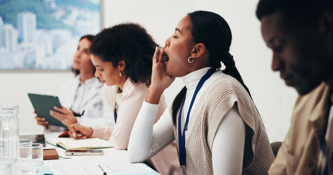 Meeting, woman and yawn in office, tired or low energy at tedious training workshop for business. Bored, fatigue or people in conference room with information overload, long event or sleepy with team
