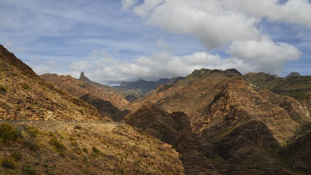 Roque Bentayga, Roque Nublo, Massif Central, cloudy blue sky, Barranco de la Aldea, gorge, Gran Canaria, Canary Islands, Spain