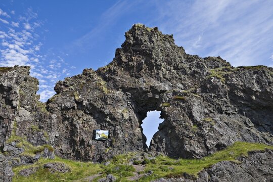 Rock window, bizarre rock formations on the beach at Djupal&oacute;nssandur, Snaefellsness Peninsula, Iceland, Atlantic Ocean