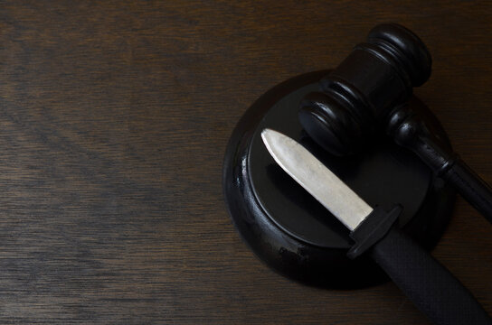 Criminal Justice and Violent Crime Concept with Judge Gavel and Knife