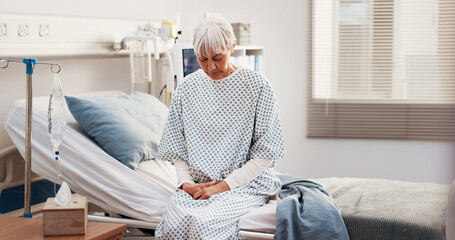 Healthcare, thinking and elderly woman on hospital bed for waiting, discharge delay and lonely....