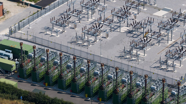 Aerial view of electrical substation and power generation facility